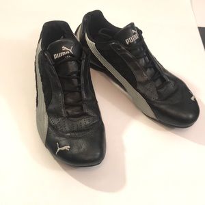 Woman’s Puma black leather and quilted suede